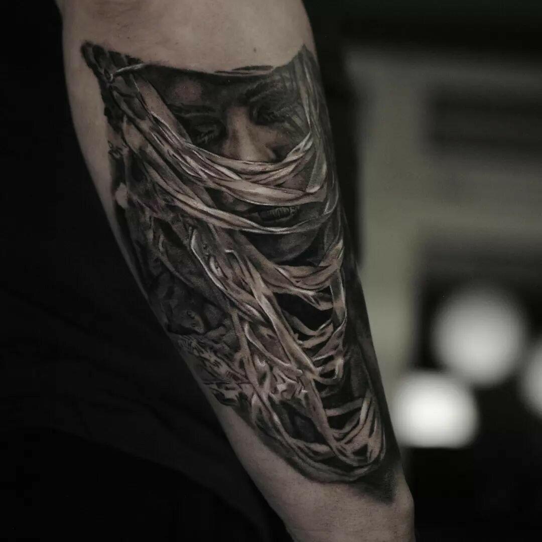 Inksearch tattoo Marcin Nencek Grey eye Tattoo