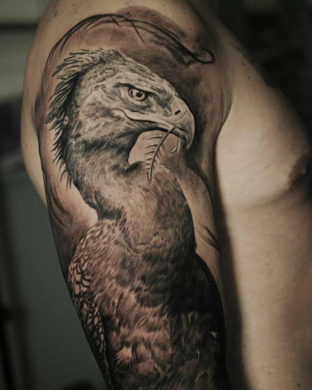 Inksearch tattoo Marcin Nencek Grey eye Tattoo