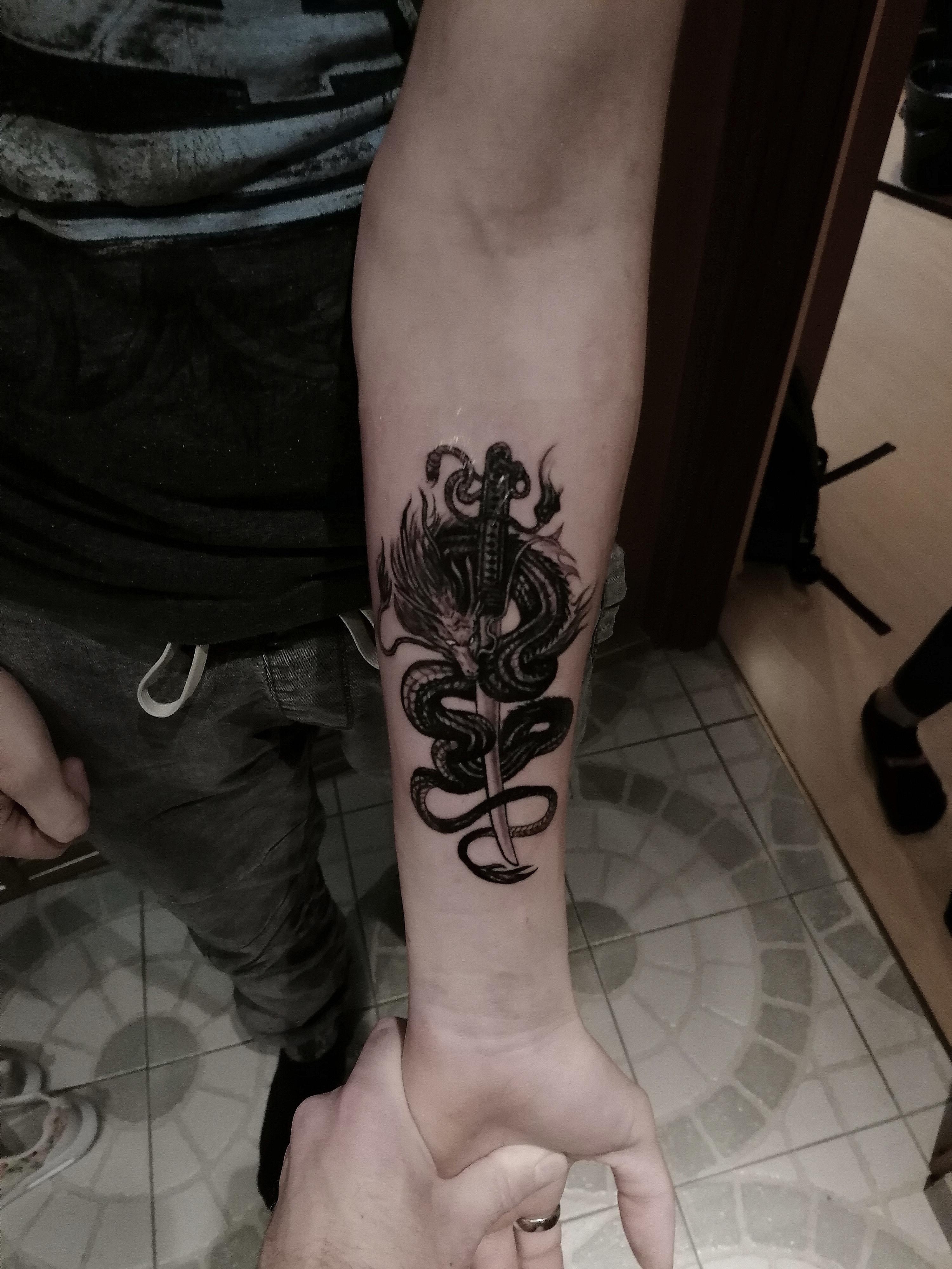 Inksearch tattoo Titanium Tattoo & Barber