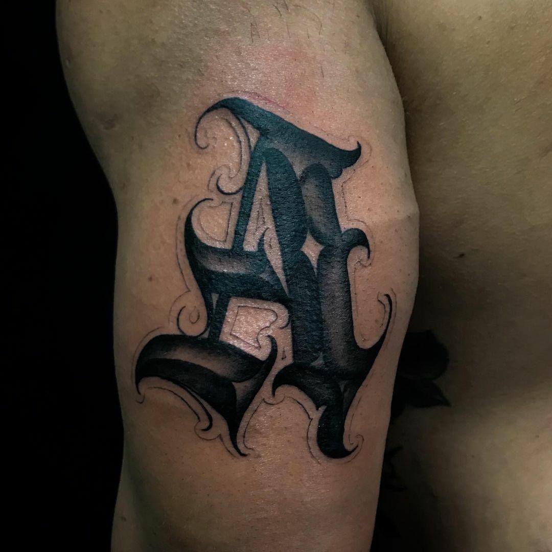 Inksearch tattoo Antonio Lettering