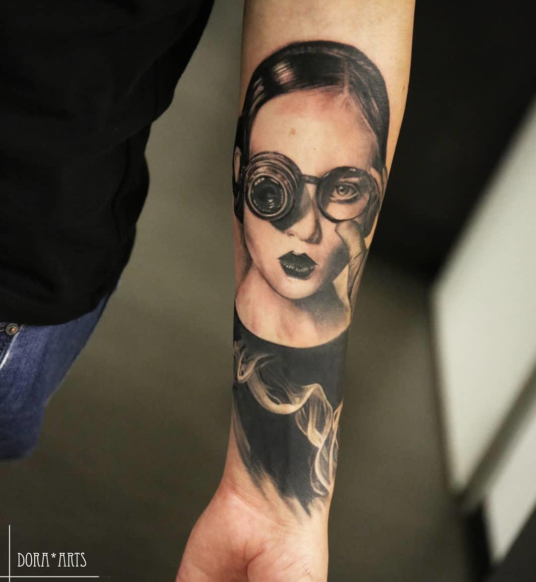 Inksearch tattoo Dora Arts