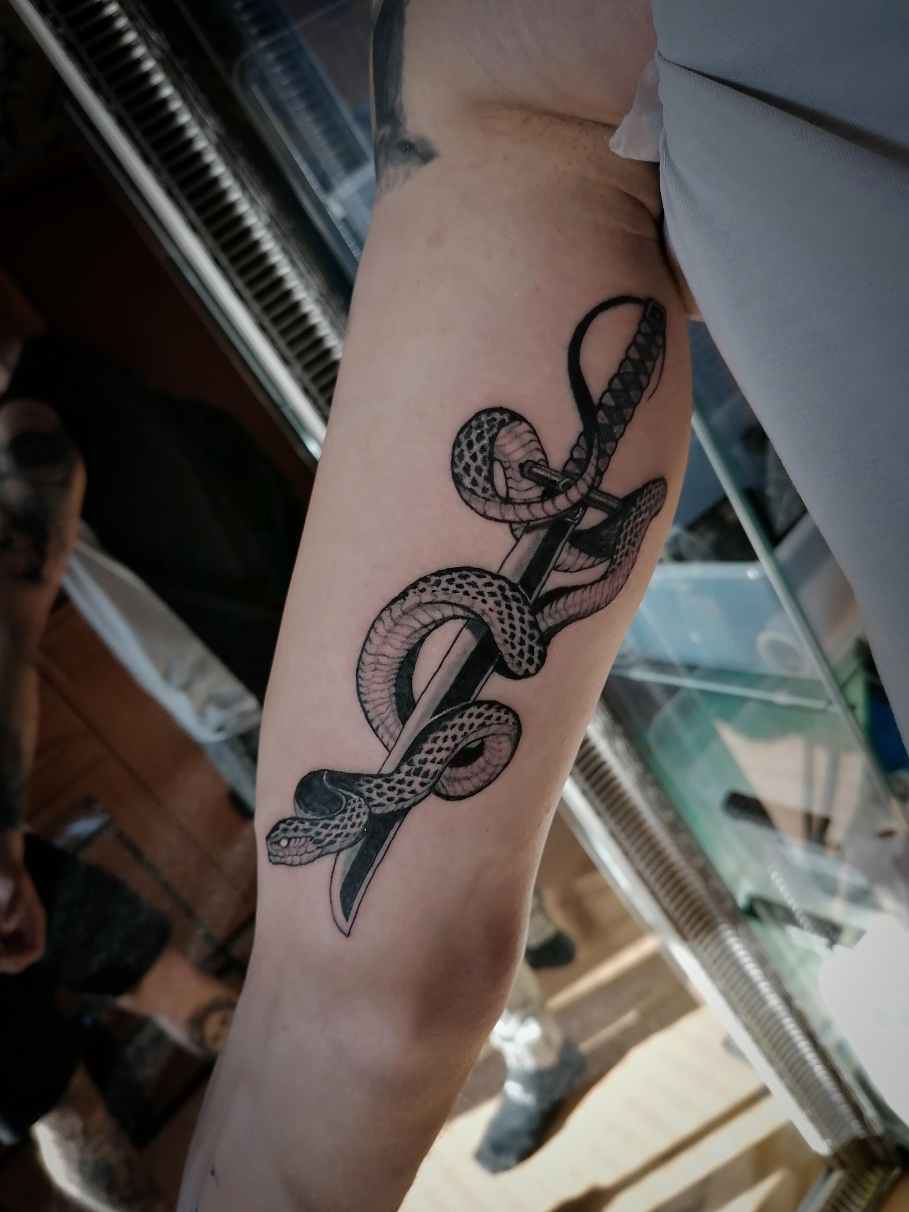 Inksearch tattoo Titanium Tattoo & Barber