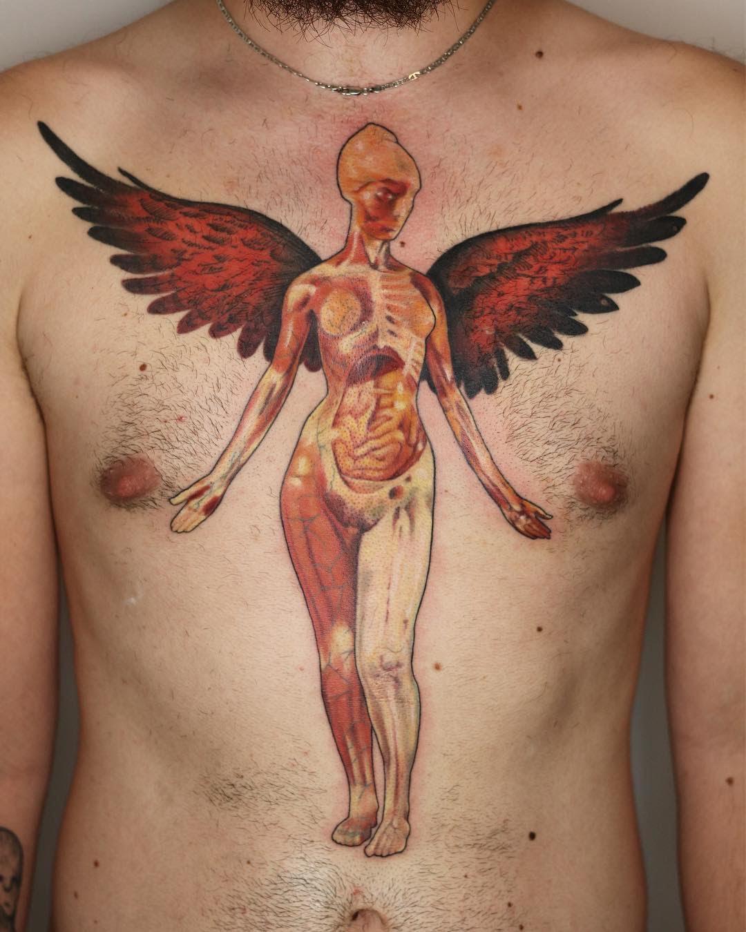 Inksearch tattoo Konrad Kondrat